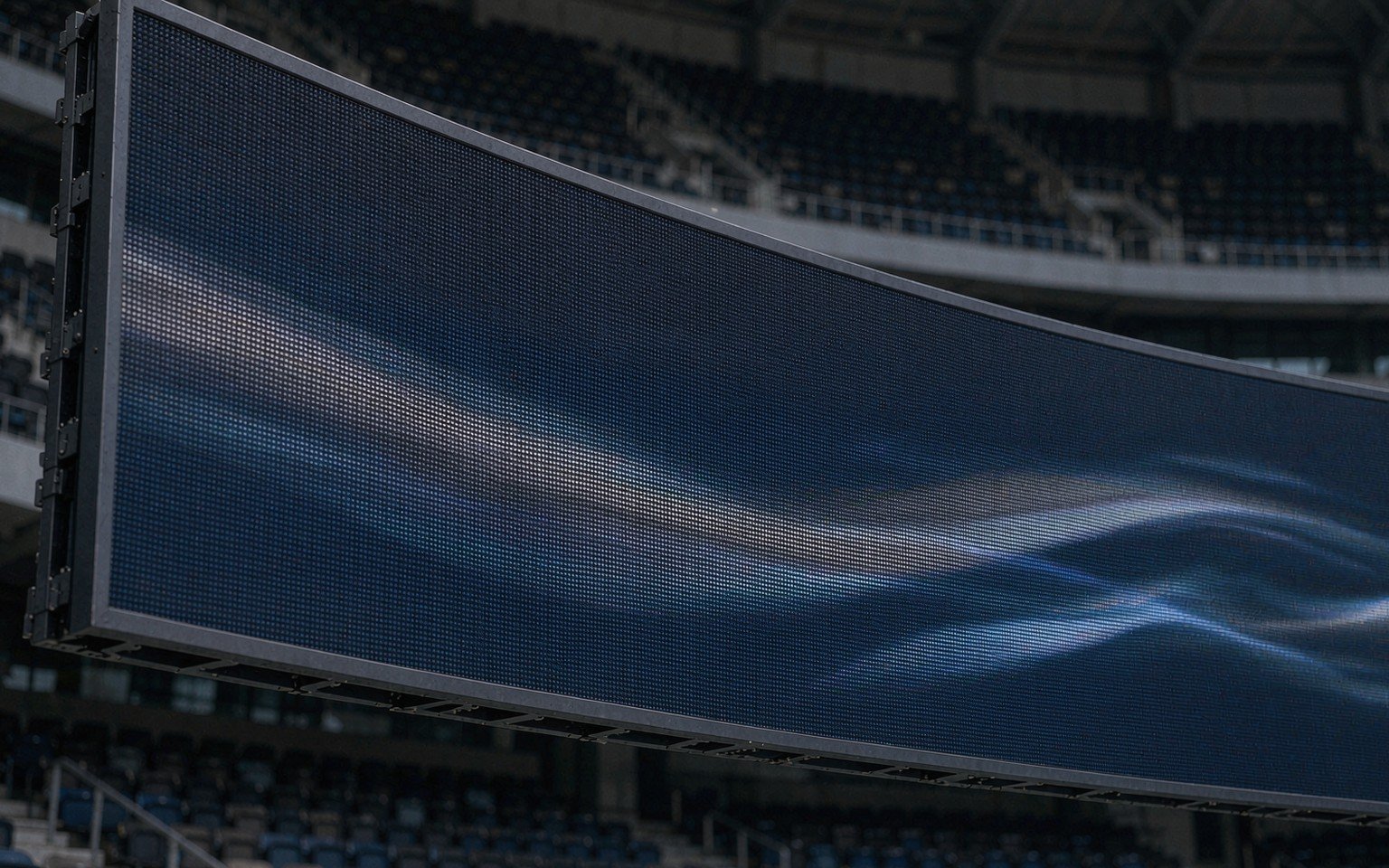LED ribbon screen around a football stadium stand