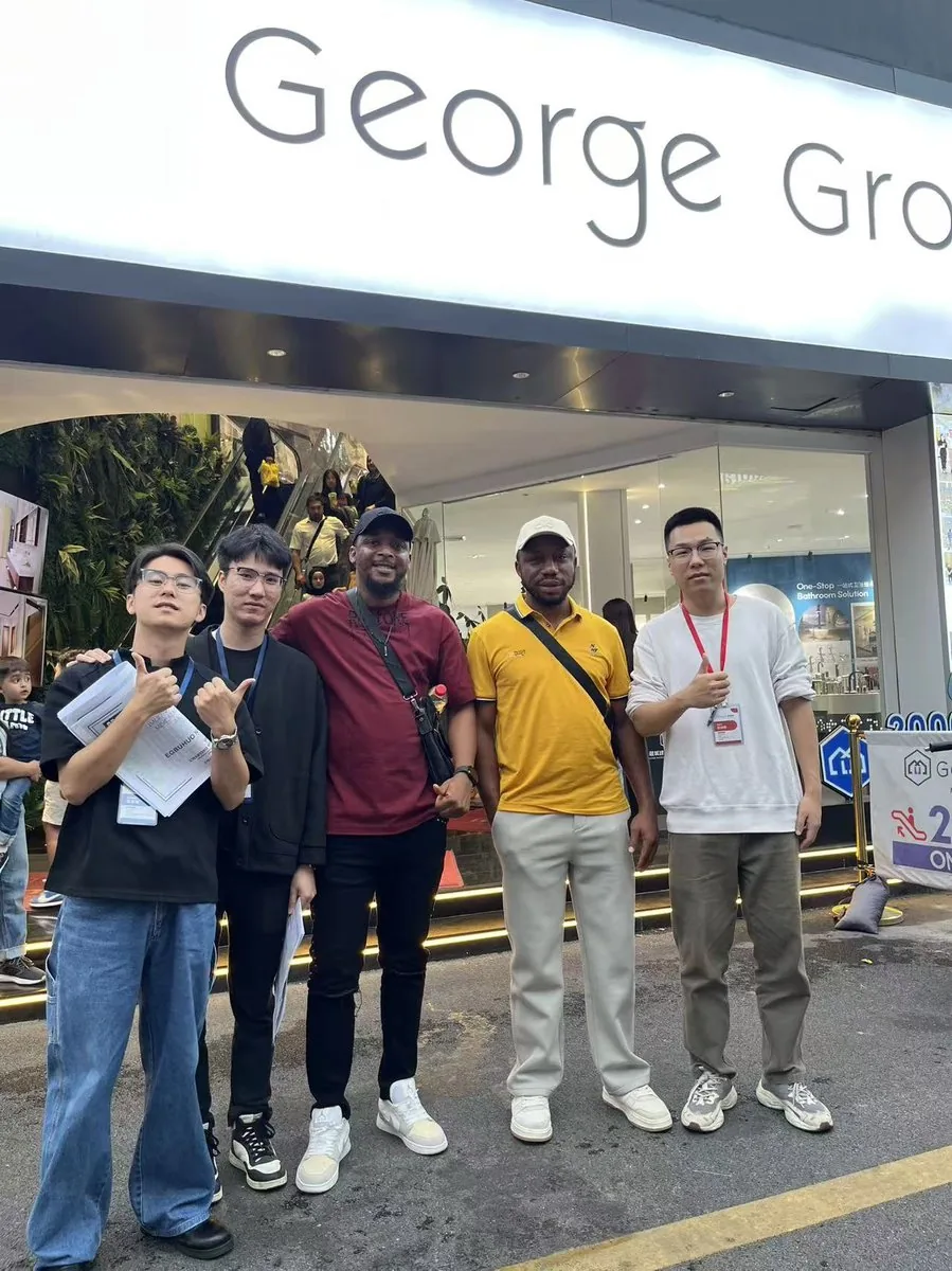 Partners at the George Group headquarters entrance
